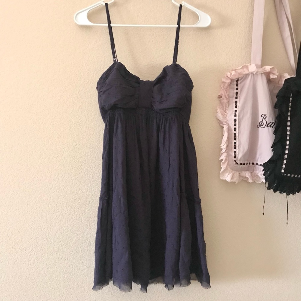 NWOT Free People babydoll dress in a dark purple or eggplant color